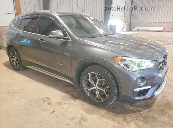 WBXHT3C33G5E52741 2016 BMW X1 Gray Delantero derecho