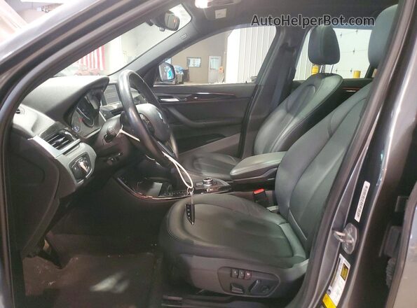 WBXHT3C33G5E52741 2016 BMW X1 Gray Vista interior delantera