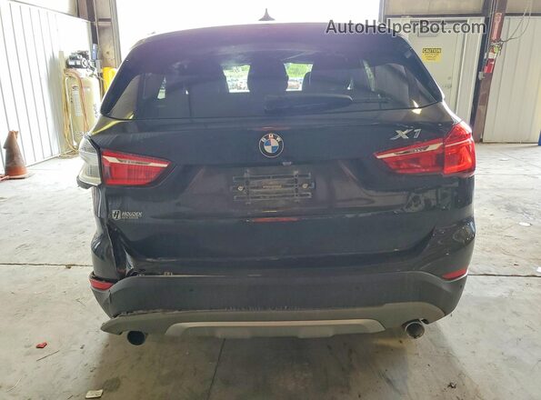 WBXHT3C33G5F65833 2016 BMW X1 Черный Вид сзади