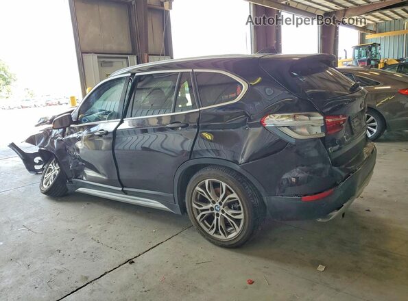 WBXHT3C33G5F65833 2016 BMW X1 Черный Задняя левая четверть