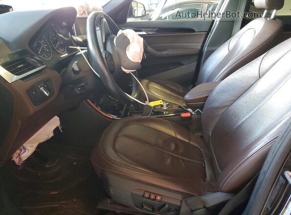 WBXHT3C33G5F65833 2016 BMW X1 Черный Вид салона спереди