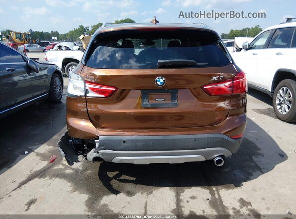 WBXHT3C33H5F72606 2017 BMW X1 Brown წინა ხედი