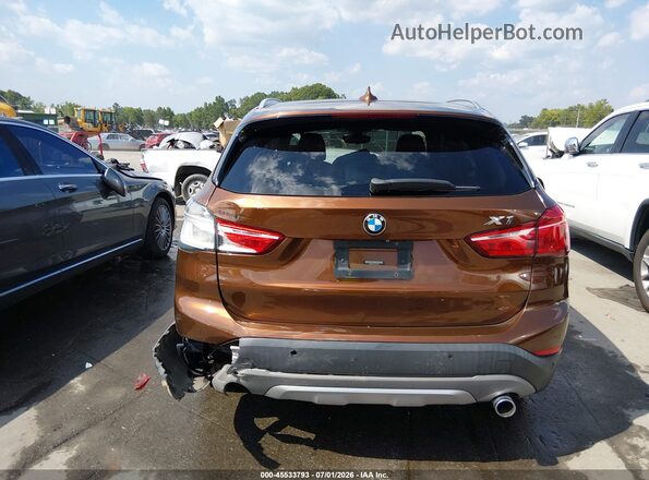 WBXHT3C33H5F72606 2017 BMW X1 Brown 