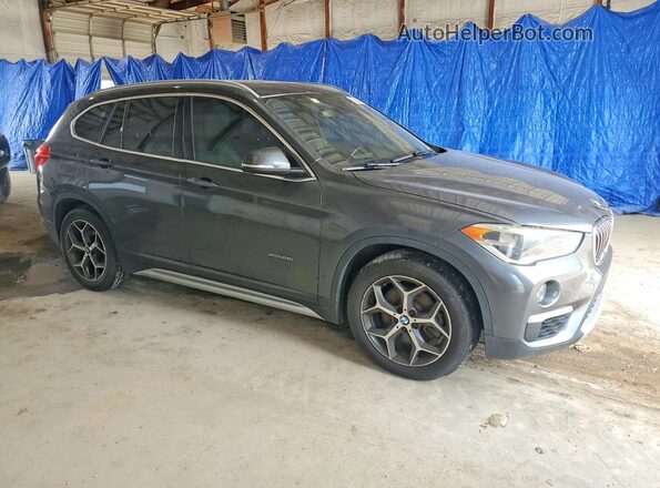 WBXHT3C33H5F78762 2017 BMW X1 Gray Przód prawy