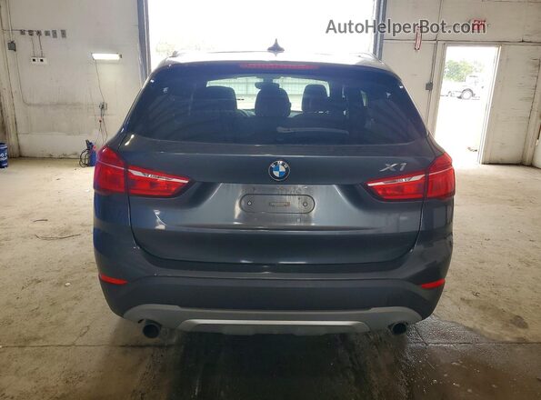 WBXHT3C33H5F78762 2017 BMW X1 Gray Widok z tyłu