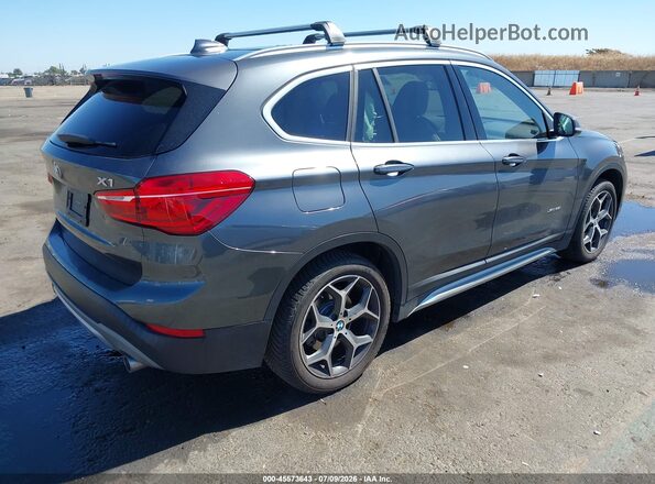 WBXHT3C33J5F91906 2018 BMW X1 Gray Trasero derecho