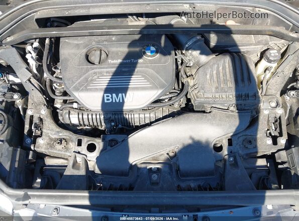 WBXHT3C33J5F91906 2018 BMW X1 Gray Vista trasera