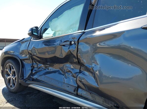 WBXHT3C33J5F91906 2018 BMW X1 Gray 