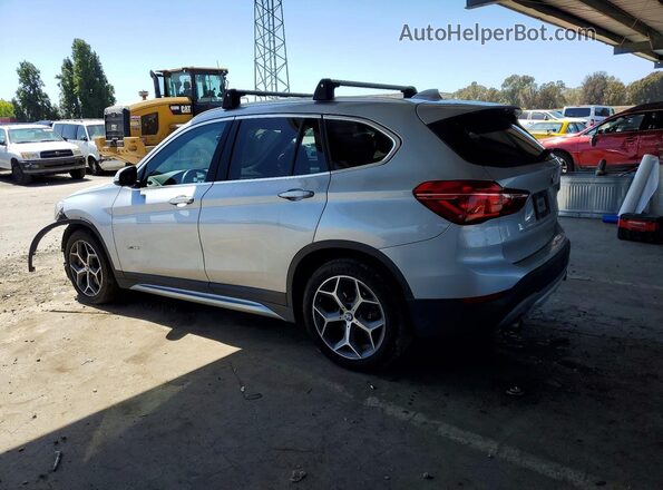 WBXHT3C33J5K30771 2018 BMW X1 Silver Rear left