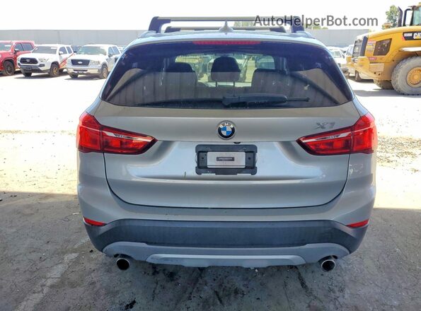 WBXHT3C33J5K30771 2018 BMW X1 Silver Rear view