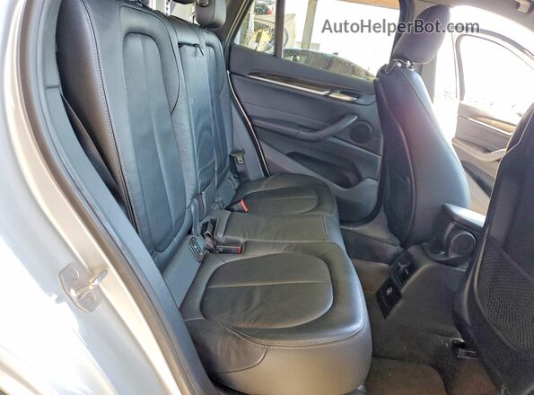 WBXHT3C33J5K30771 2018 BMW X1 Silver Rear seats view