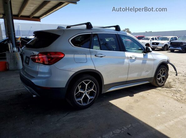 WBXHT3C33J5K30771 2018 BMW X1 Silver Rear right