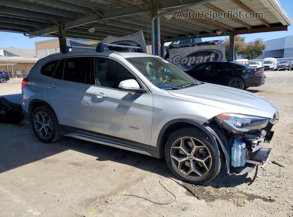 WBXHT3C33J5K30771 2018 BMW X1 Silver Front right