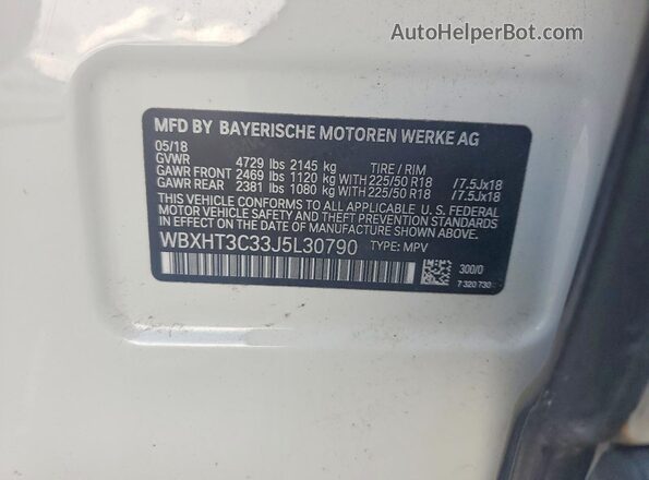 WBXHT3C33J5L30790 2018 BMW X1 White Vista de la etiqueta del VIN