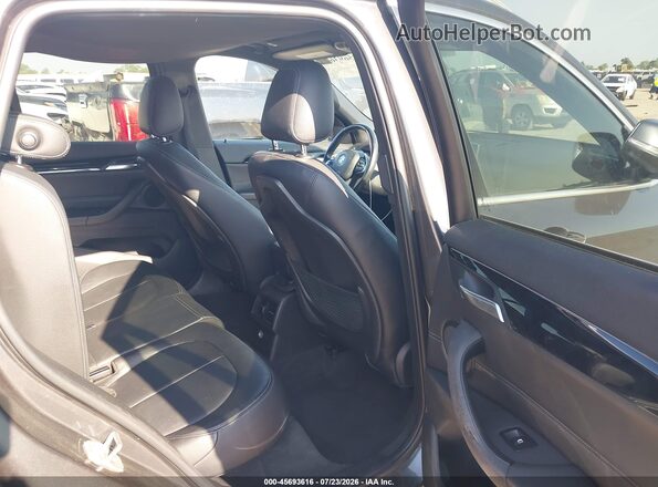 WBXHT3C34GP887849 2016 BMW X1 Black VIN sticker view
