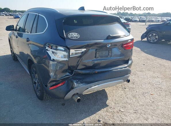 WBXHT3C34GP887849 2016 BMW X1 Black Front view