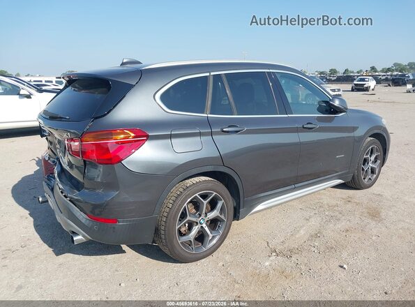 WBXHT3C34GP887849 2016 BMW X1 Black Rear right