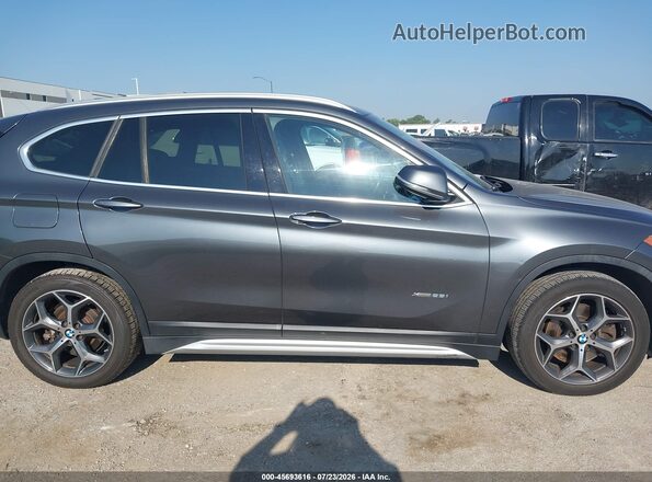 WBXHT3C34GP887849 2016 BMW X1 Black Rear interior view