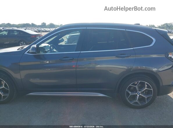 WBXHT3C34GP887849 2016 BMW X1 Black 360 interior view