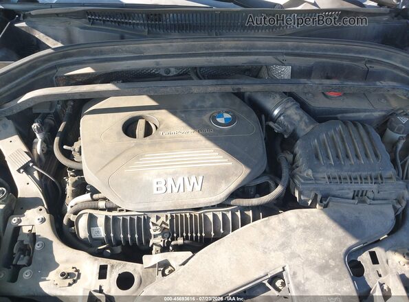 WBXHT3C34GP887849 2016 BMW X1 Black Rear view