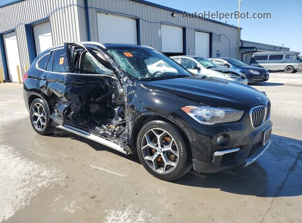 WBXHT3C34J5K32030 2018 BMW X1 Черный Передняя правая четверть