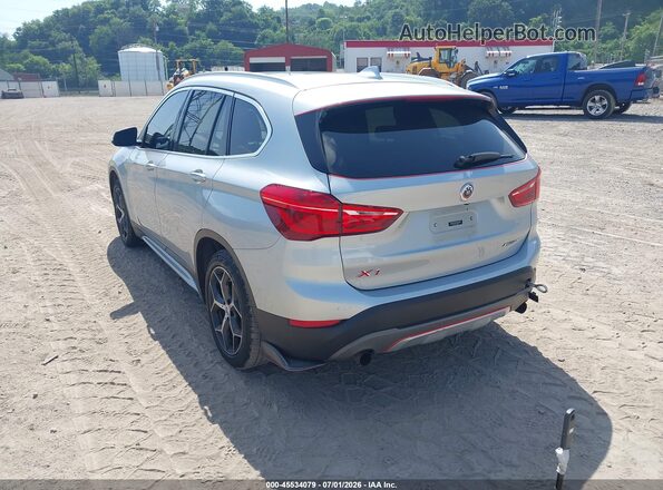 WBXHT3C34J5L32919 2018 BMW X1 Silver Rear left