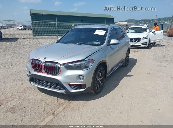 WBXHT3C34J5L32919 2018 BMW X1 Silver Front left