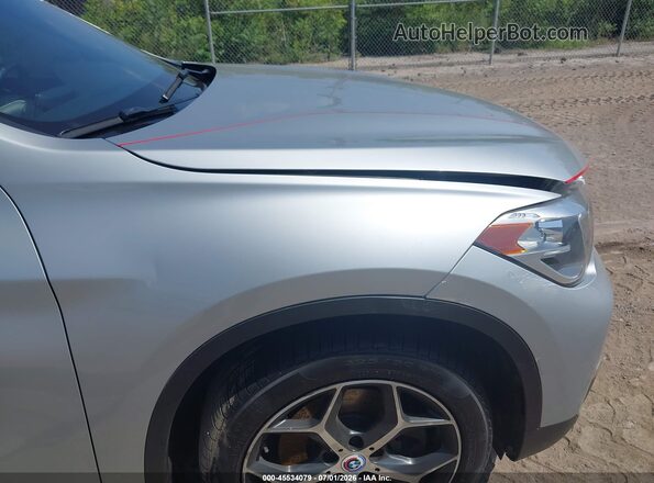 WBXHT3C34J5L32919 2018 BMW X1 Silver Front view