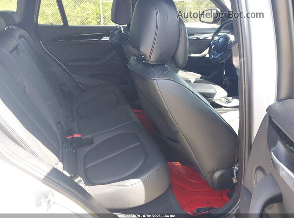 WBXHT3C34J5L32919 2018 BMW X1 Silver VIN sticker view