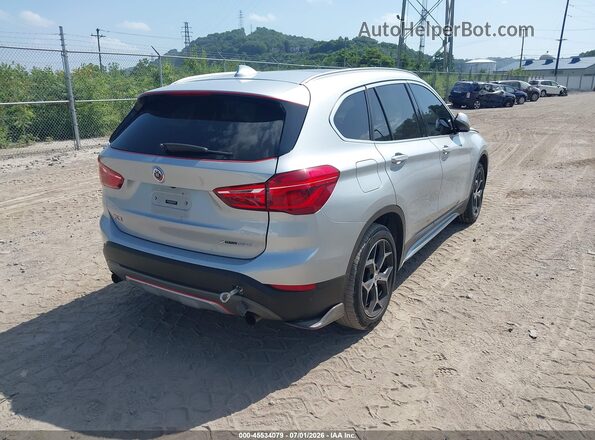 WBXHT3C34J5L32919 2018 BMW X1 Silver Rear right