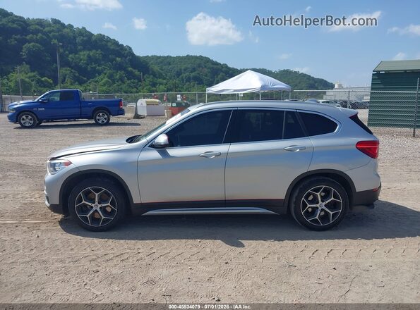 WBXHT3C34J5L32919 2018 BMW X1 Silver 360 interior view