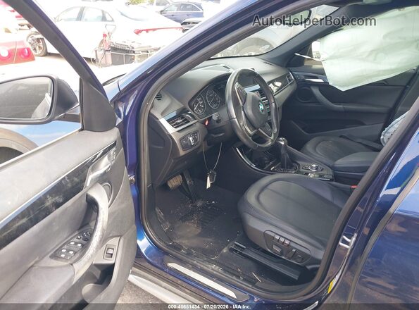 WBXHT3C35G5E51378 2016 BMW X1 Blue Вид салону спереду