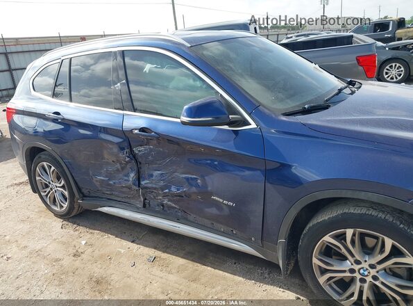 WBXHT3C35G5E51378 2016 BMW X1 Blue Вид спереду