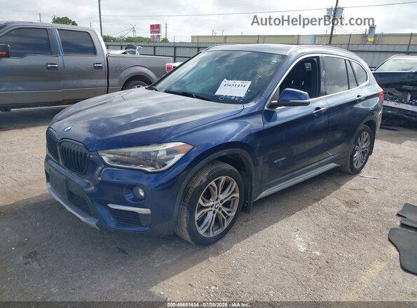 WBXHT3C35G5E51378 2016 BMW X1 Blue Передня ліва чверть