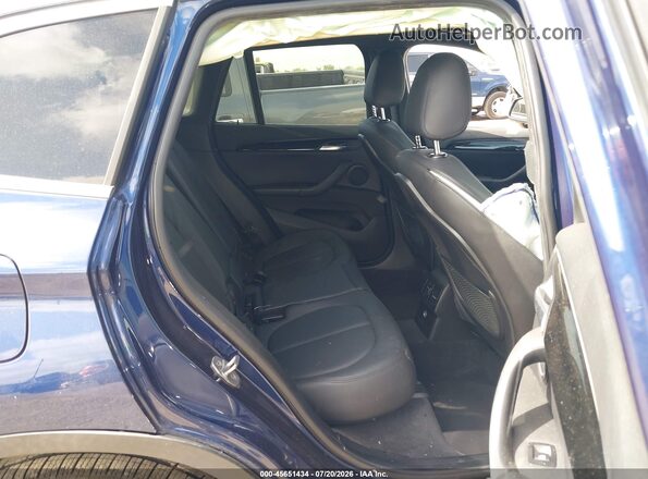 WBXHT3C35G5E51378 2016 BMW X1 Blue Вид наклейки з VIN-кодом