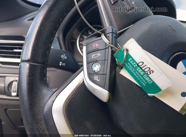 WBXHT3C35G5E51378 2016 BMW X1 Blue Вид панелі приладів