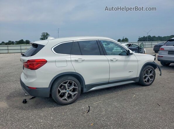 WBXHT3C35GP884586 2016 BMW X1 White Trasero derecho