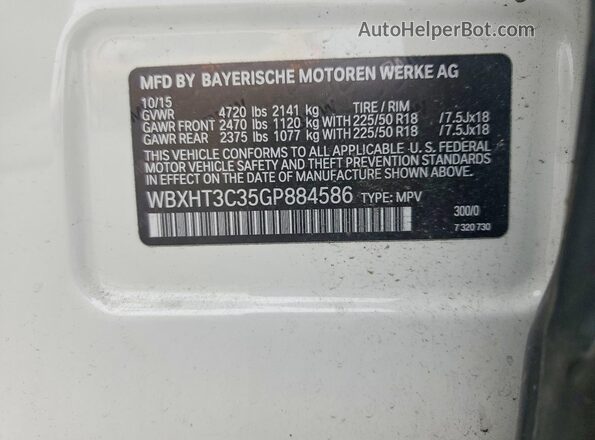 WBXHT3C35GP884586 2016 BMW X1 White Vista de la etiqueta del VIN