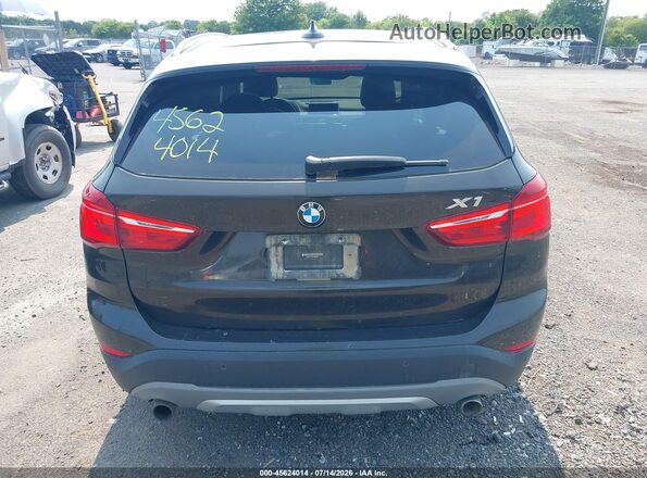WBXHT3C35GP886287 2016 BMW X1 Коричневый 