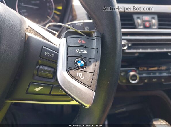 WBXHT3C35GP886287 2016 BMW X1 Коричневый Вид панели приборов