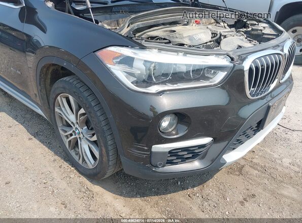 WBXHT3C35GP886287 2016 BMW X1 Коричневый 