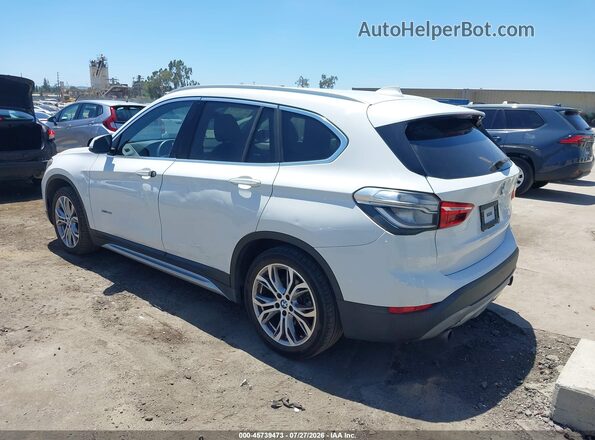 WBXHT3C35H5F78309 2017 BMW X1 Белый Задняя левая четверть