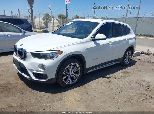 WBXHT3C35H5F78309 2017 BMW X1 Белый Передняя левая четверть