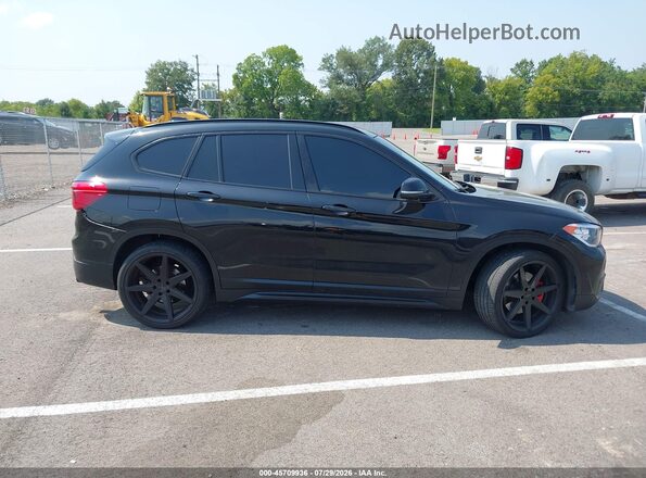 WBXHT3C35J5L27860 2018 BMW X1 Черный Вид задней части салона