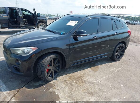 WBXHT3C35J5L27860 2018 BMW X1 Черный Передняя левая четверть