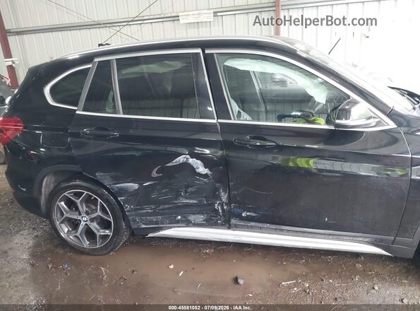 WBXHT3C35J5L31116 2018 BMW X1 Black Вид задньої частини салону