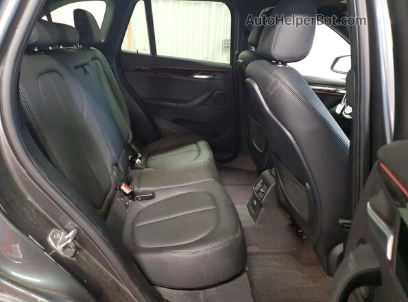 WBXHT3C36G5E53687 2016 BMW X1 Charcoal Вид задньої частини салону