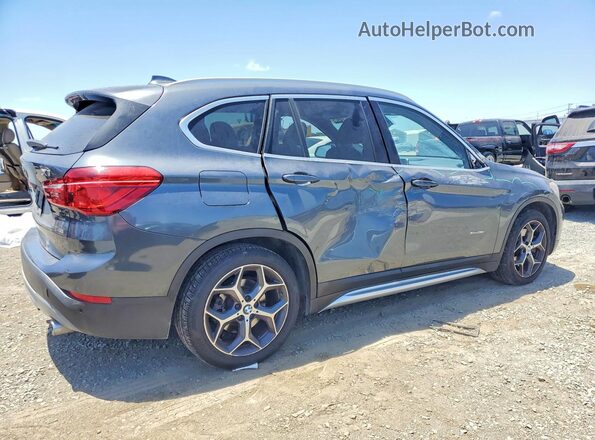 WBXHT3C36GP884581 2016 BMW X1 Gray Trasero derecho