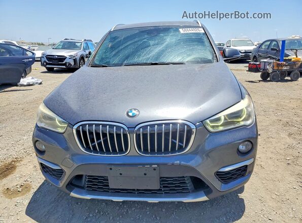 WBXHT3C36GP884581 2016 BMW X1 Gray Vista frontal