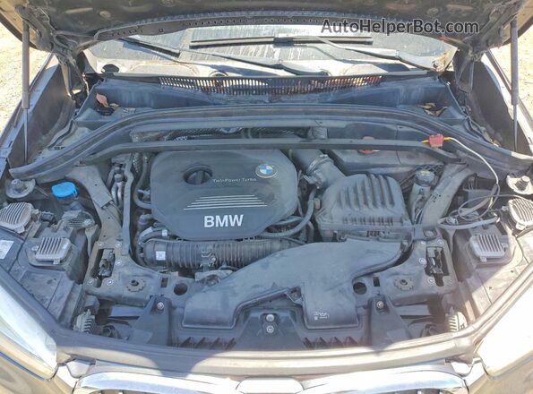 WBXHT3C36GP884581 2016 BMW X1 Gray Vista del compartimento del motor